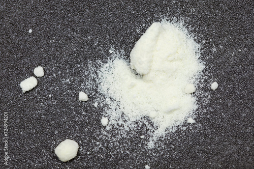 Silver nitrate (AgNO3), a light-darkening, photosensitive substance.