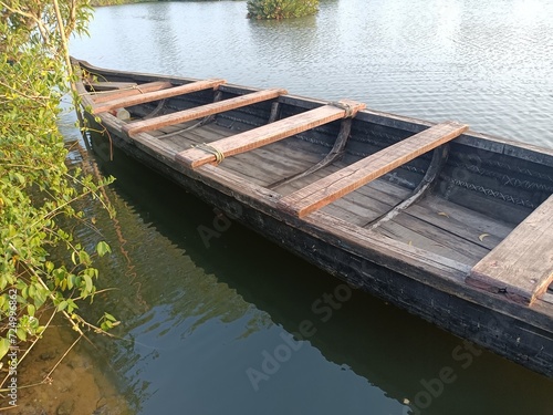 A wooden vehicle used for water transport is usually called a canoe. 