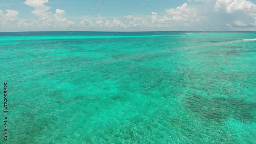 Catamaran and boats with tourist ready to enjoy a day in the paradise, turquoise waters of Cozumel Catamaran and boats with tourist ready to enjoy a day in the paradise, turquoise waters of Cozumel