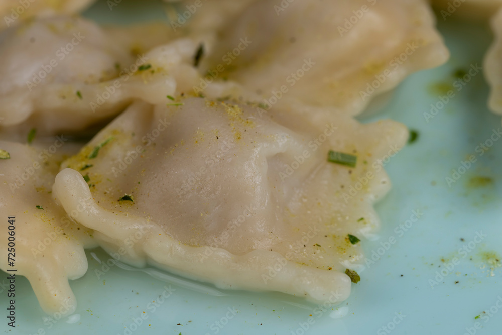 small dumplings with wheat flour and pieces of meat small dumplings with wheat flour and pieces of meat