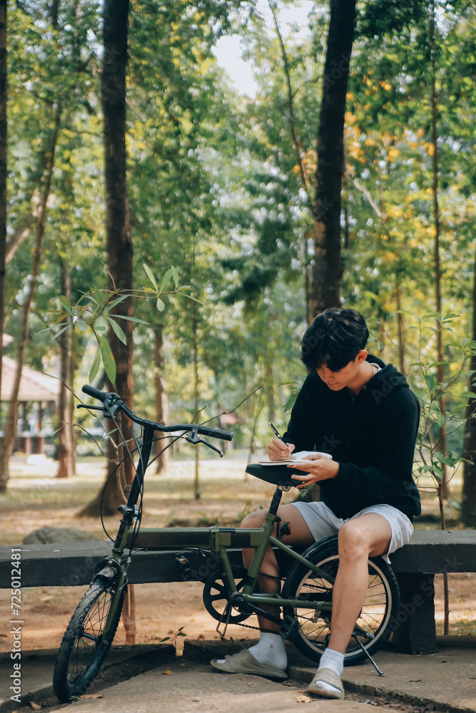 Handsome happy young man with bicycle on a city street, Active lifestyle, people concept Handsome happy young man with bicycle on a city street, Active lifestyle, people concept