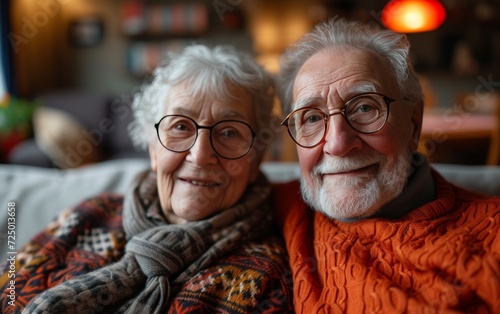 grandparents sitting on couch enjoying the good occasion
