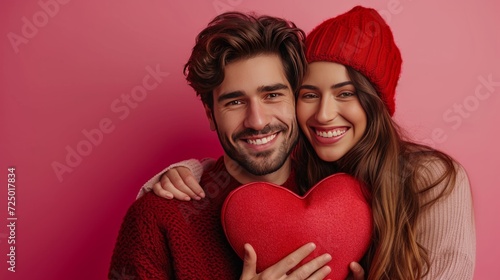 man gives his beloved girlfriend a heart-shaped box