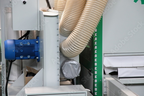 Dust removal ventilation system of the woodworking machine - Big plastic pipes and powerful electric motor 