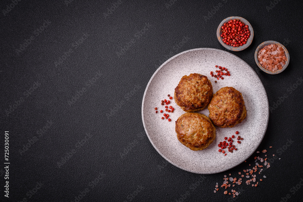 Delicious fresh fried minced fish cutlets with spices and herbs Delicious fresh fried minced fish cutlets with spices and herbs