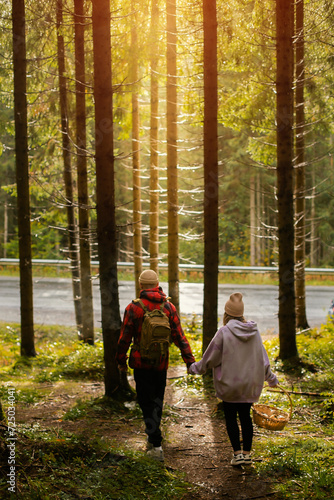 Couple walking in mountain forest