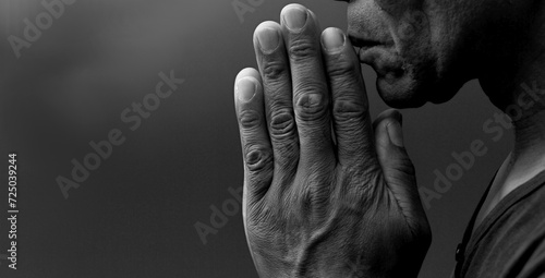  black man praying to god with black grey background with people stock image stock photo