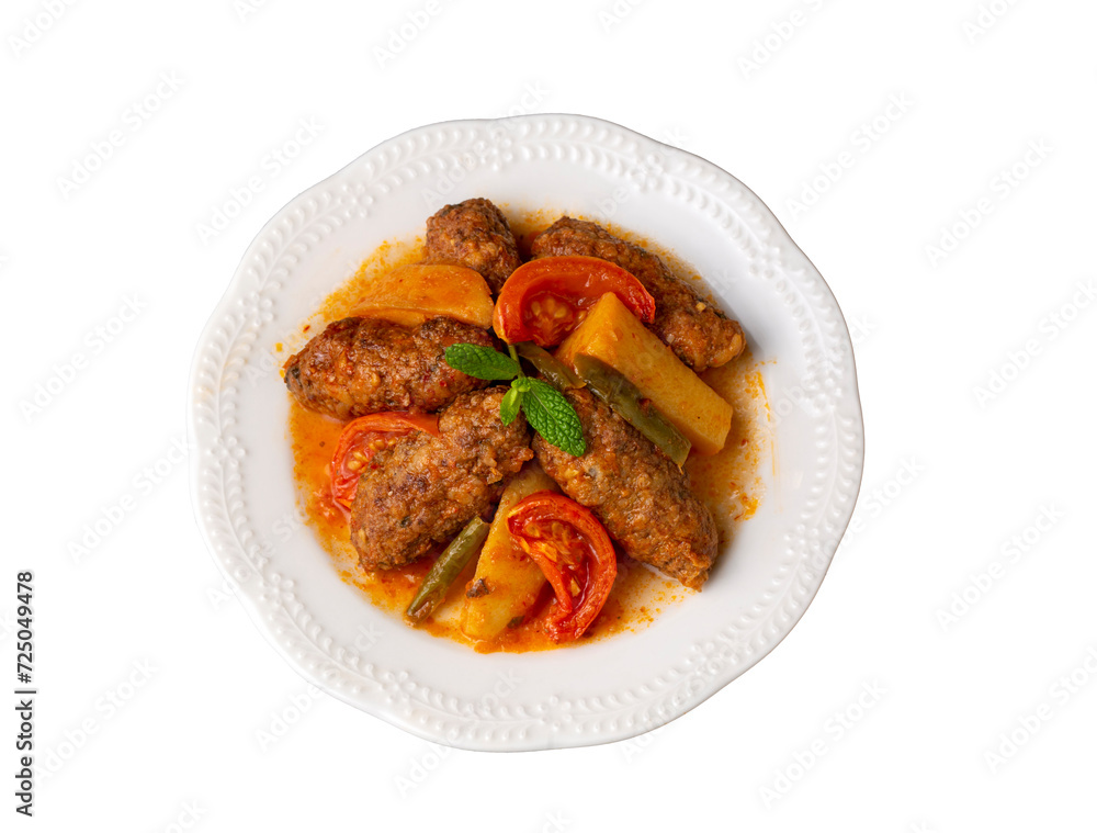 Traditional Homemade Turkish Food Kofte - Kofta with Tomato Sauce and Potatoes. (Turkish name; Izmir kofte) Traditional Homemade Turkish Food Kofte - Kofta with Tomato Sauce and Potatoes. (Turkish name; Izmir kofte)