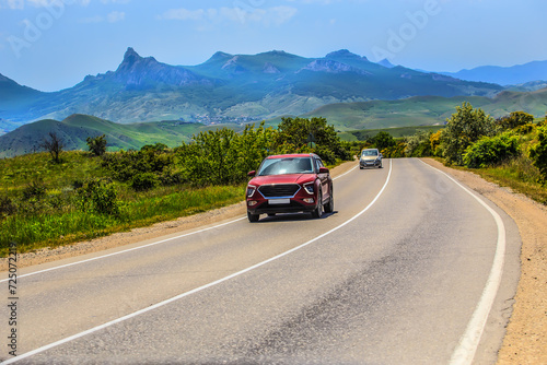 Cars moving on the road in the mountains