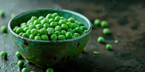 Green Bowl Filled With Peas on Table © FryArt Studio
