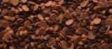 Dark chocolate chips for hot chocolate preparation or dessert ingredients.