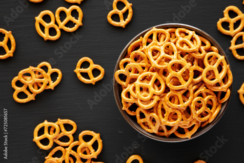 Mini Pretzels with Salt in a Bowl, top view. Flat lay.