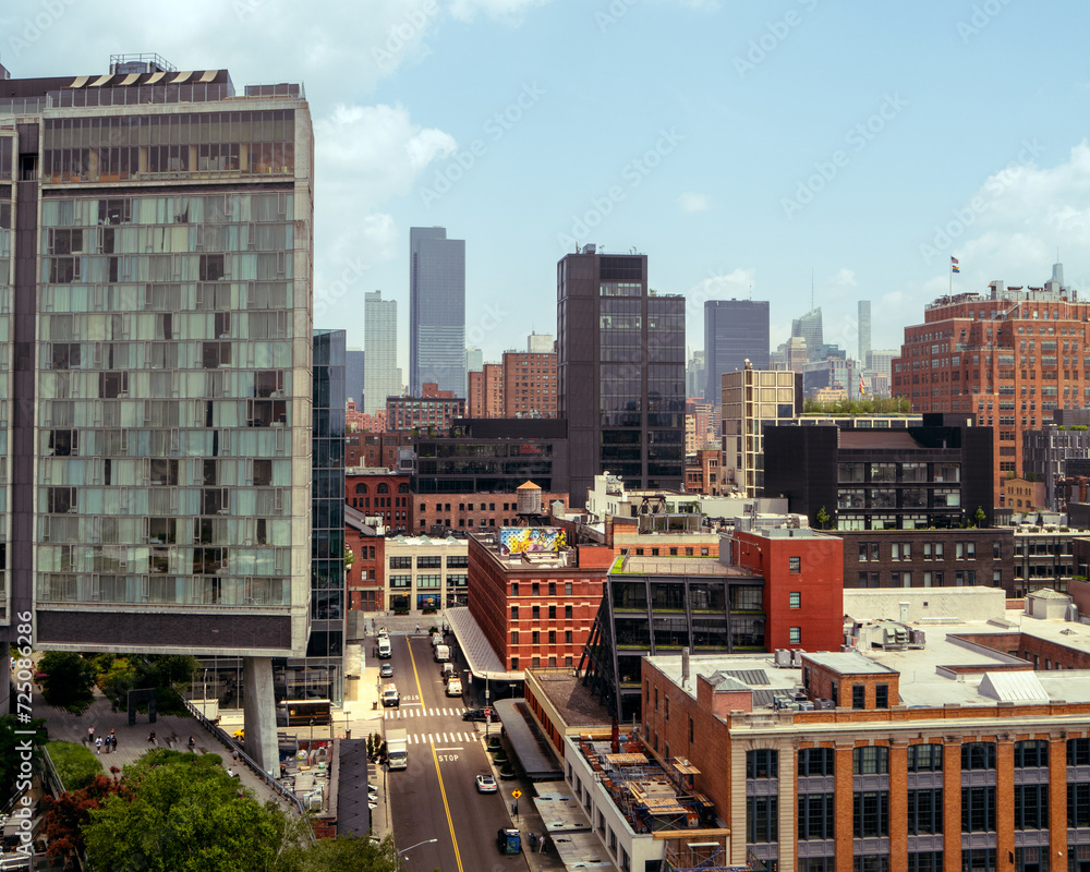 Manhattan, New York City, Meat Packing District overlooking Greenwich and west village in bright, warm and cinematic daylight. Skyscrapers and traditional American red brick buildings