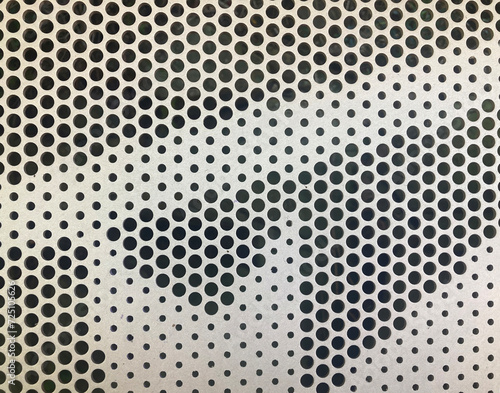 Fotografie Gold metallic perforated patterned sheet metal