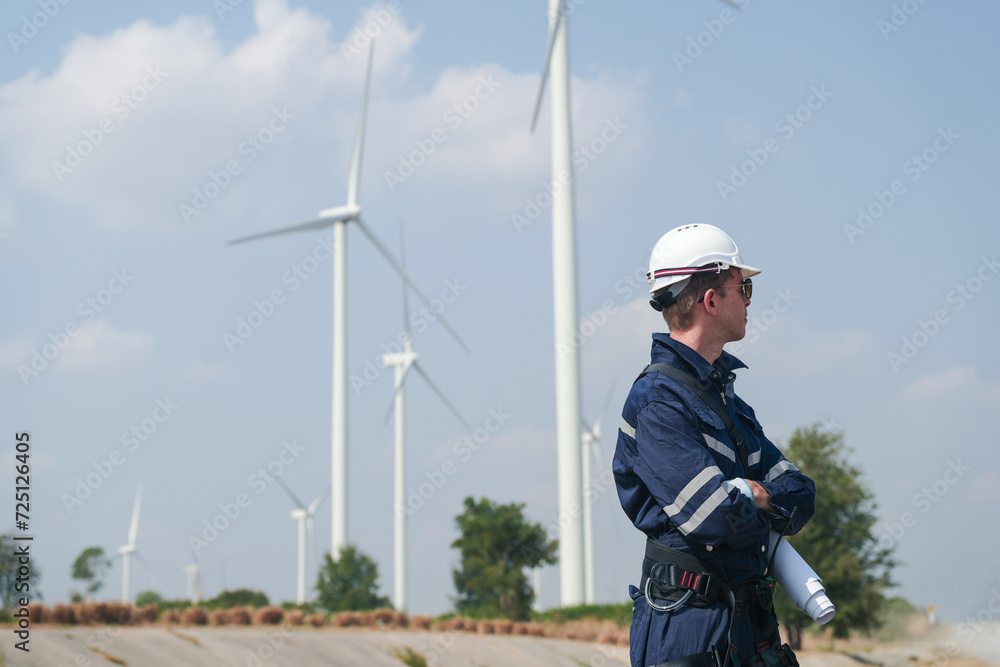 engineers working in fieldwork outdoor. Workers walking and inspect construction and machine around project site. Wind turbine electrical of clean resource enerdy and environment sustainable. engineers working in fieldwork outdoor. Workers walking and inspect construction and machine around project site. Wind turbine electrical of clean resource enerdy and environment sustainable.