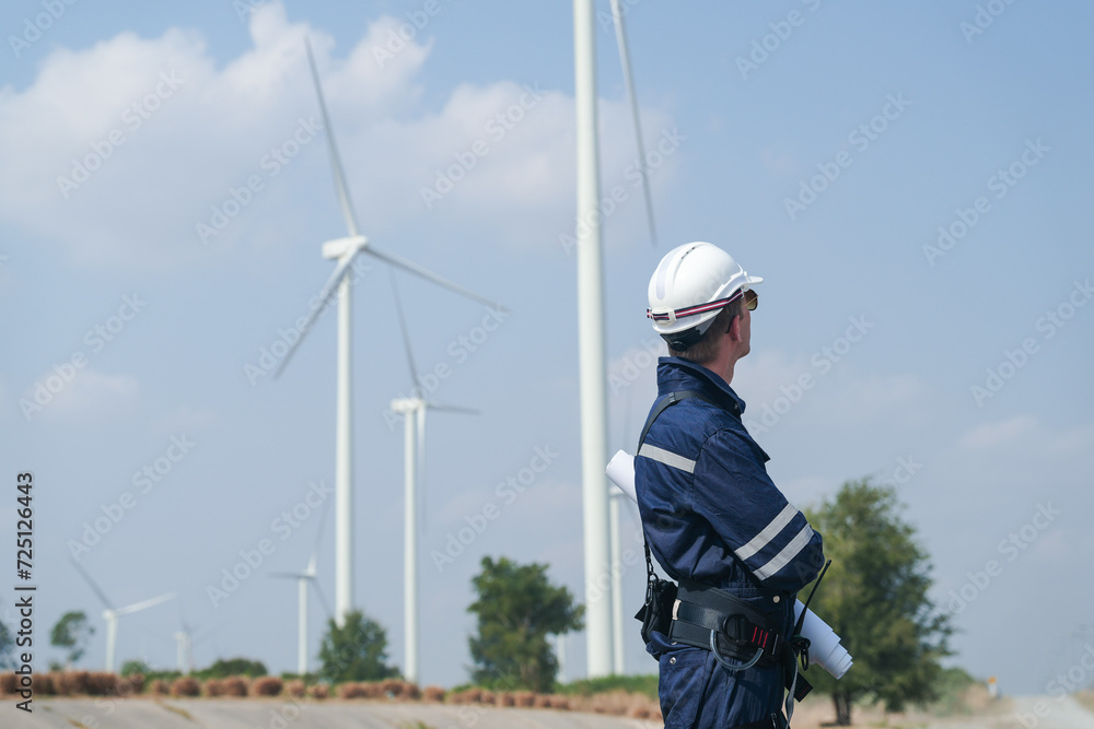 engineers working in fieldwork outdoor. Workers walking and inspect construction and machine around project site. Wind turbine electrical of clean resource enerdy and environment sustainable. engineers working in fieldwork outdoor. Workers walking and inspect construction and machine around project site. Wind turbine electrical of clean resource enerdy and environment sustainable.