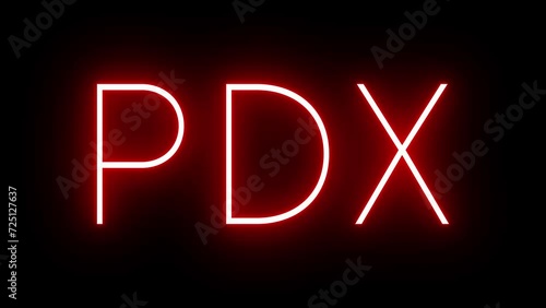 Red retro neon sign with the three-letter identifier for PDX Portland International Airport photo