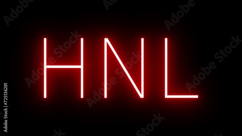 Red retro neon sign with the three-letter identifier for HNL Honolulu International Airport photo