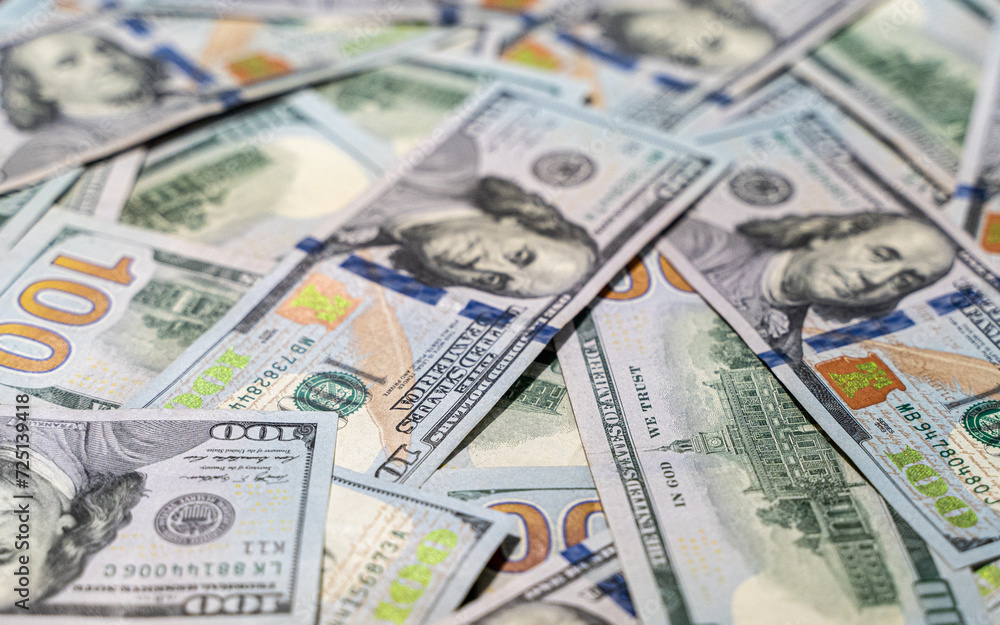 Close up view of cash money, 100 one hundred US dollar bills, 50 US dollar bills, 20 US dollar bills, lots of cash. Close up view of cash money, 100 one hundred US dollar bills, 50 US dollar bills, 20 US dollar bills, lots of cash.