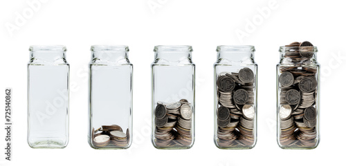 Growing savings concept. Glass jar of coins isolated on white background. Jars with different level of coins with clipping path photo