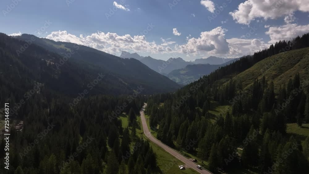 aerial view of dolomites valley with some clouds aerial view of dolomites valley with some clouds