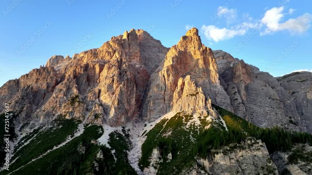 drone panorama during sunset of the golden peak of the dolomites drone panorama during sunset of the golden peak of the dolomites