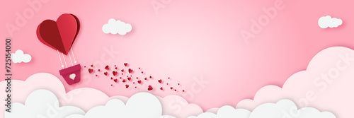 Paper cut  style air heart shaped balloon floating over the sky. Paper art of love and Valentine Day concept, free space for your text
