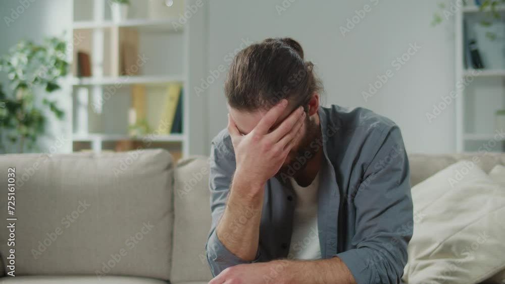 Upset Man With Headache Try to Relax and Relieve Pain by Massages Her Head. Office Syndrome. Upset Man With Headache Try to Relax and Relieve Pain by Massages Her Head. Office Syndrome.