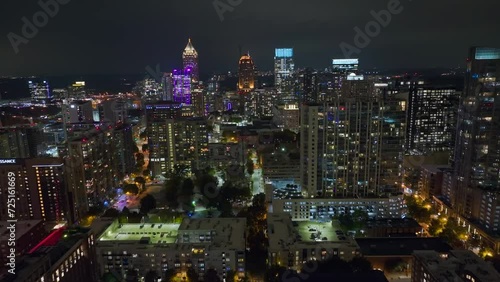 Aerial view of downtown district of Atlanta city in Georgia, USA. Brightly illuminated high skyscraper buildings in modern american midtown photo
