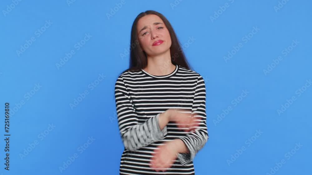 Sad young Caucasian woman feeling hopelessness loneliness, nervous breakdown, loses becoming surprised by lottery results, bad fortune, loss unlucky news. Attractive girl isolated on blue background Sad young Caucasian woman feeling hopelessness loneliness, nervous breakdown, loses becoming surprised by lottery results, bad fortune, loss unlucky news. Attractive girl isolated on blue background