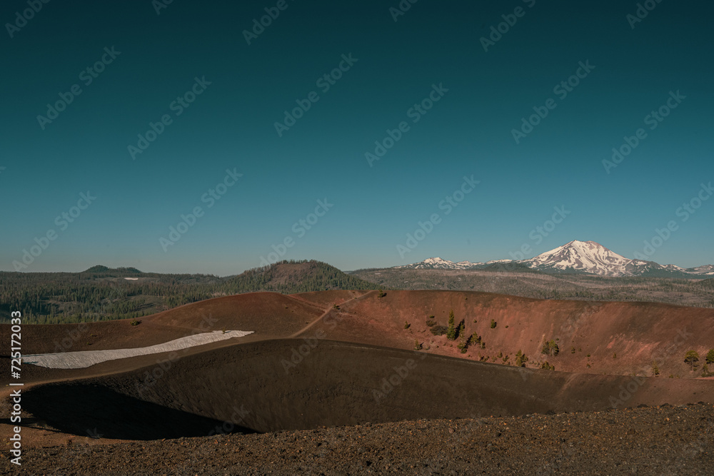 Clear Sky Over Cinder Cone Wtih Lassen Peak In The Distance