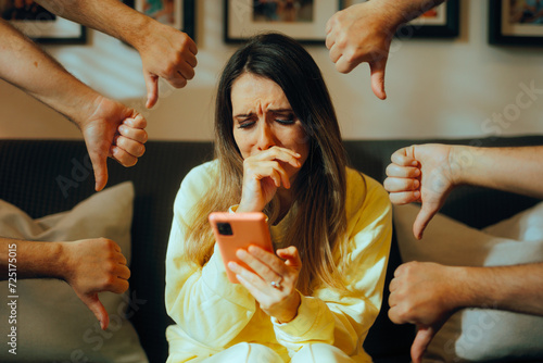 Unhappy Woman Receiving Online Bullying and Negative Internet Feedback. Girl crying suffering after virtual harassment and humiliation
 photo