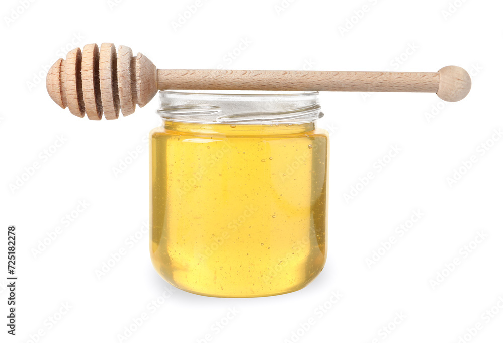 Tasty honey in glass jar and dipper isolated on white Tasty honey in glass jar and dipper isolated on white