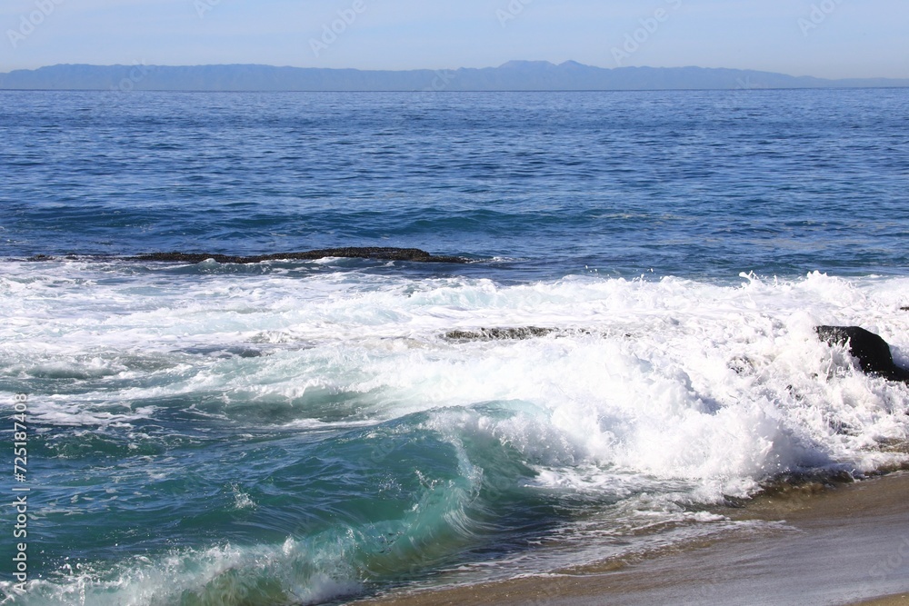 Wave breaking on a beach 