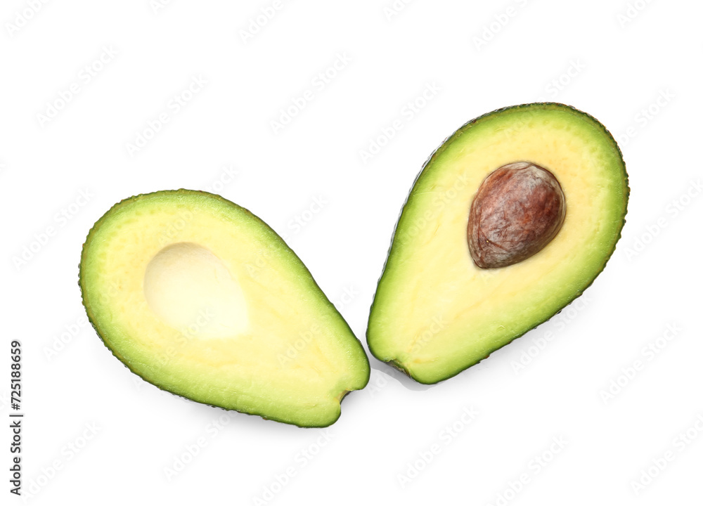 Halves of tasty ripe avocado on white background