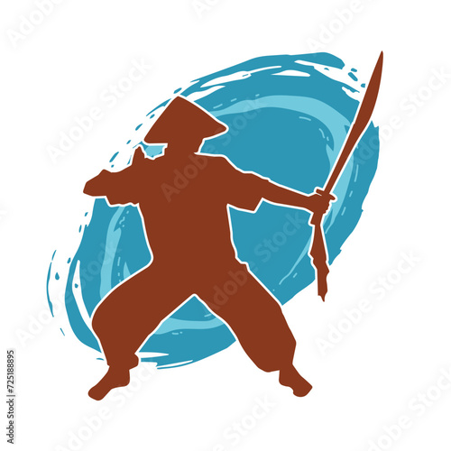 Silhouette of a kungfu or wushu martial art athlete in action pose. Silhouette of a male martial art person in pose with swords weapon.