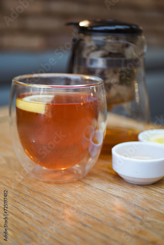  lemon tea and honey on table 