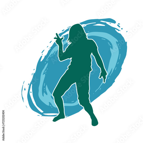 Silhouette of a slim man dancing pose. Silhouette of a male dancer in action pose.