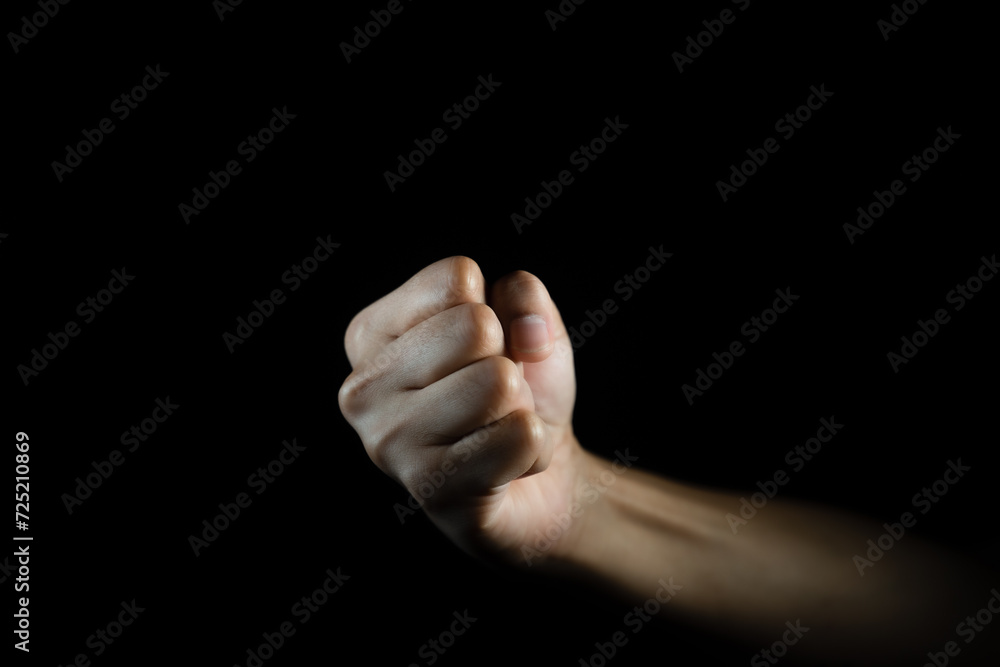 fist, Hand gesture. man clenched fist, ready to punch, isolated on black, close-up, copy space fist, Hand gesture. man clenched fist, ready to punch, isolated on black, close-up, copy space
