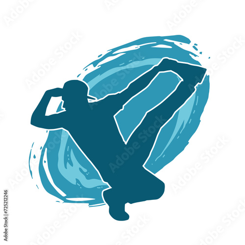 Silhouette of a man in dancing pose. Silhouette of a male dancer in performing pose.