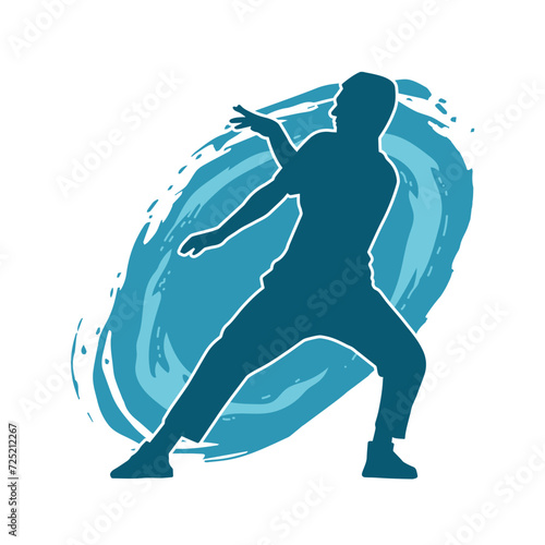 Silhouette of a man in dancing pose. Silhouette of a male dancer in performing pose.