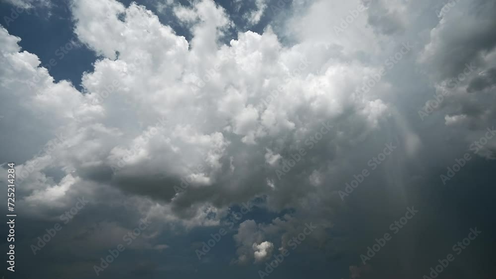 Very dramatic time lapse of gray storm clouds rolling through a dark blue sky. Rain can be seen falling in one small section of the clouds.
Very dramatic time lapse of gray storm clouds rolling through a dark blue sky. Rain can be seen falling in one small section of the clouds.