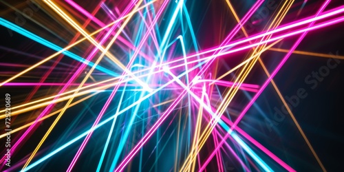 Intersecting light beams, with an array of bright, colored lines crossing over a dark background