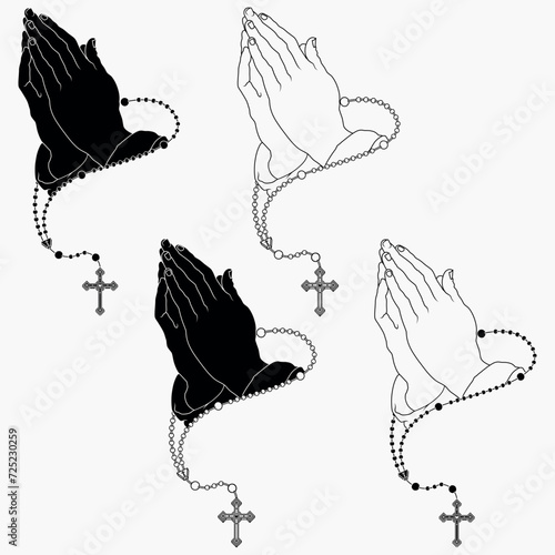 Praying hands with christian rosary