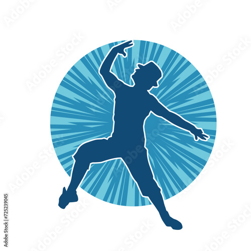 Silhouette of a man in dancing pose. Silhouette of a male dancer in performing pose.