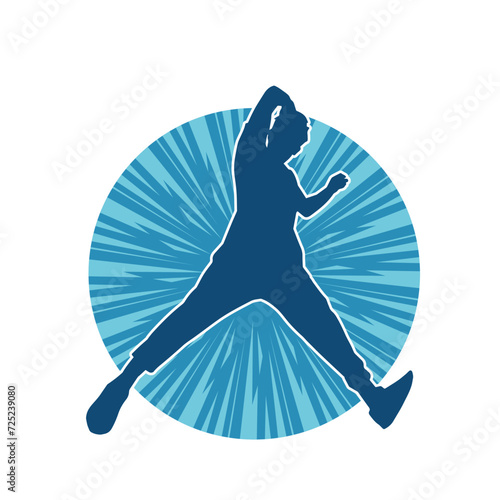 Silhouette of a man in dancing pose. Silhouette of a male dancer in performing pose.