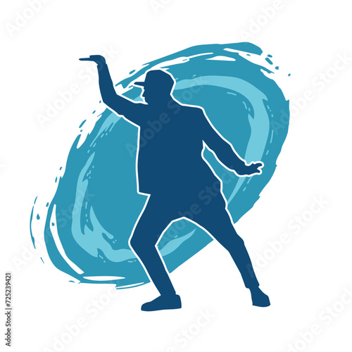 Silhouette of a man in dancing pose. Silhouette of a male dancer in performing pose.