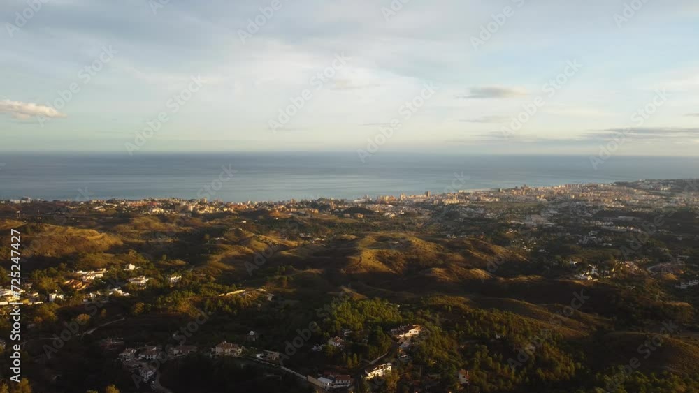 Panorama of coastal town of Spain during sunset, aerial drone view Panorama of coastal town of Spain during sunset, aerial drone view