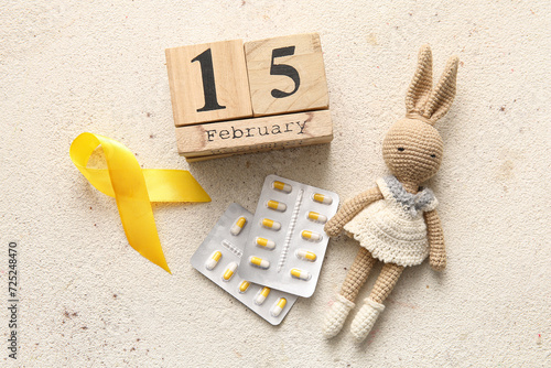 Golden ribbon with pills, c...