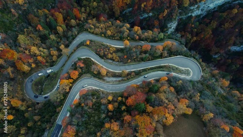 aerial view taken with drone over the lacets de septmoncel, winding road in jura departement, bourgogne franche comte region during autumn, french countryside photo
